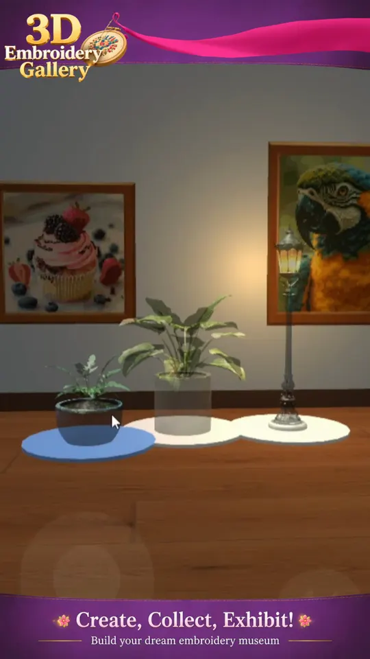 Walking through a 3D embroidery gallery in the app, with framed pieces, plants and lamps